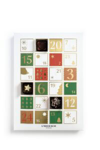 Festive Läderach Advent calendar with chocolates and holiday decorations.